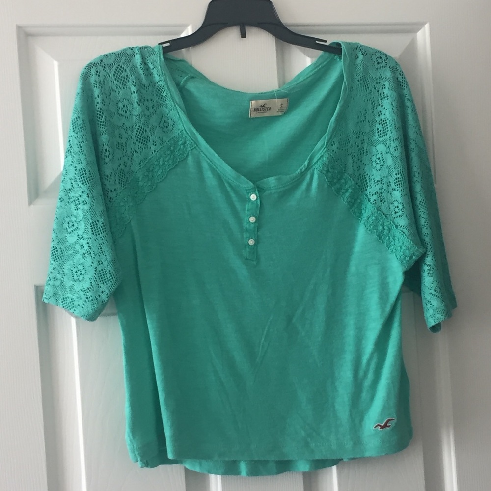 Mint green tee shirt with lace sleeve detail
